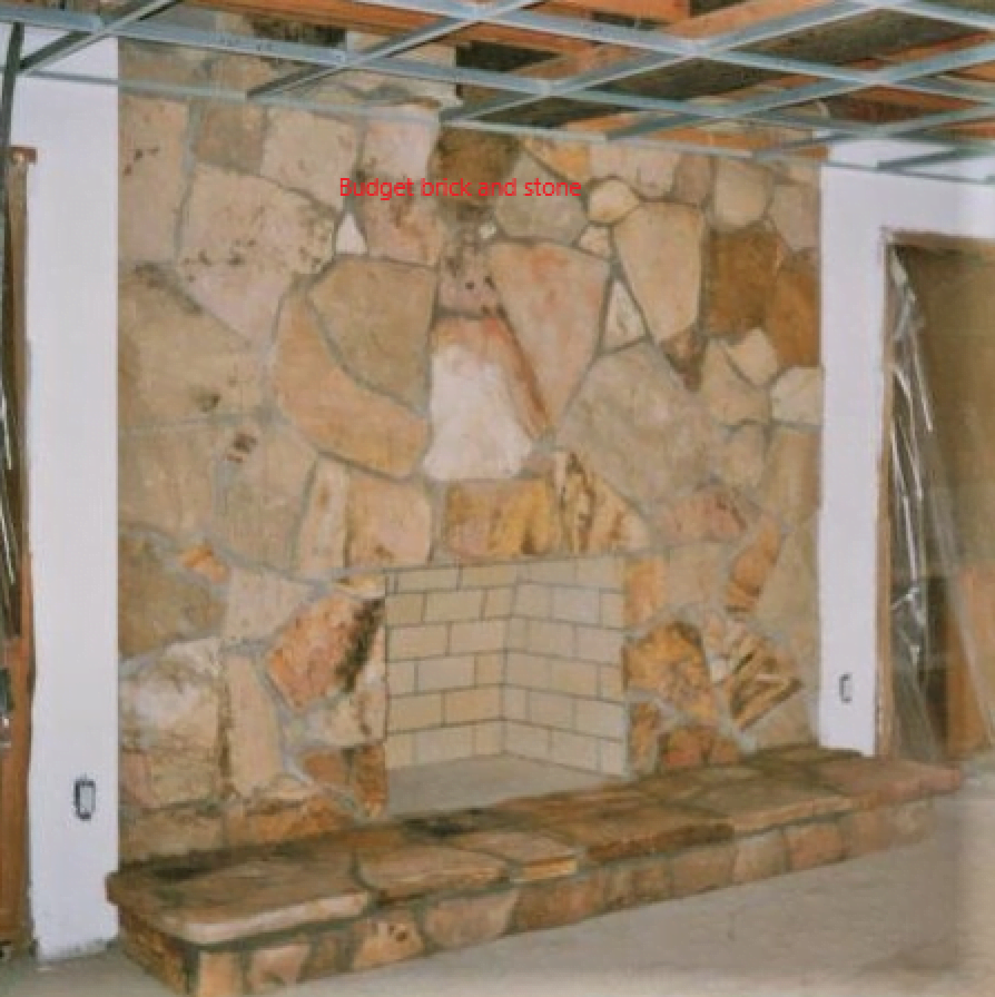 Orchard stone fireplace and hearth.