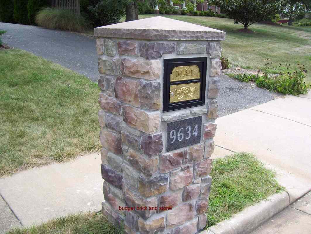 Mail box post with granite address.