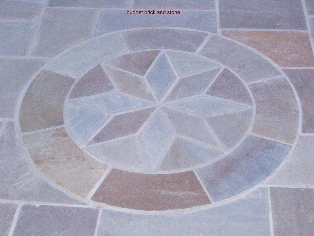 8-point compass rose in flagstone.