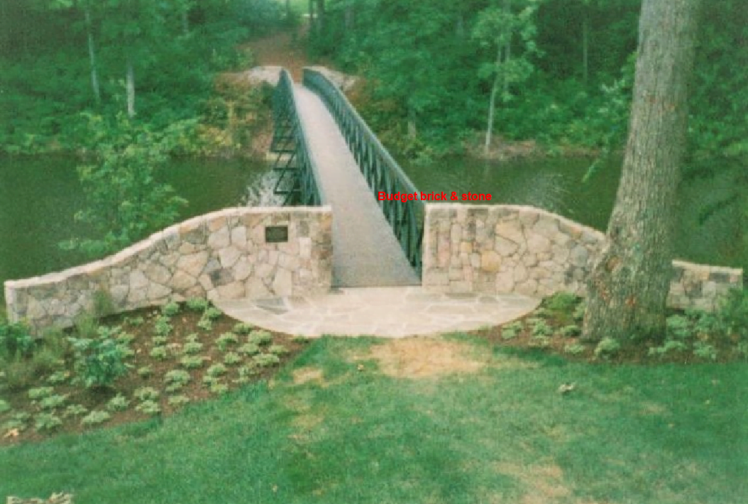Stone wall and landing both sides of bridge.